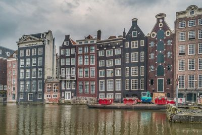 Buildings against sky in city amsterdam 