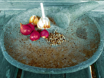 High angle view of cherries in bowl on table