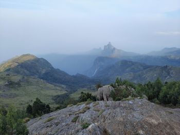 Beautiful scenic view from kodanad view point ooty of misty rain cloud hill mountain green forest