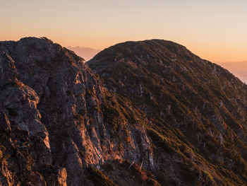 Scenic view of mountain against sky during sunset