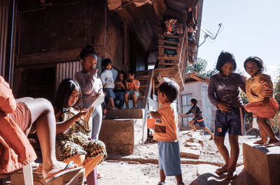 Group of people at market stall