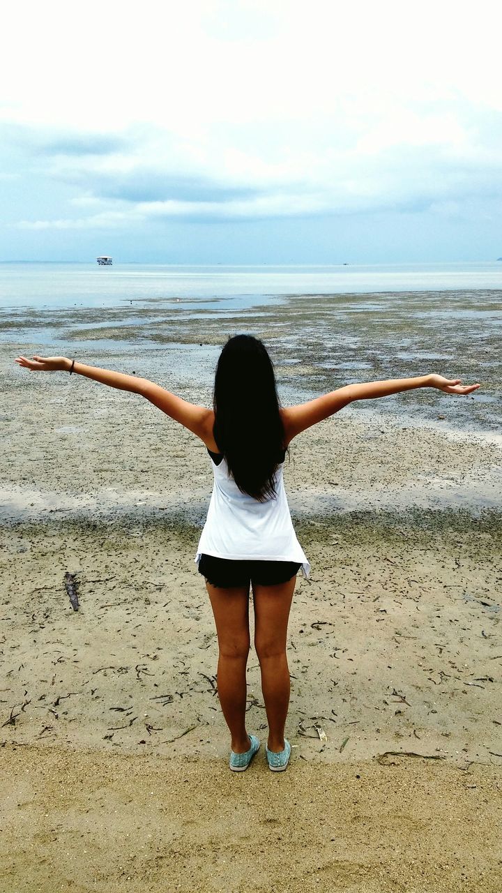 sea, beach, horizon over water, sky, water, shore, rear view, tranquility, sand, full length, tranquil scene, beauty in nature, scenics, leisure activity, standing, lifestyles, nature, idyllic