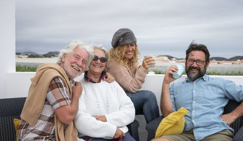 Group of people sitting outdoors