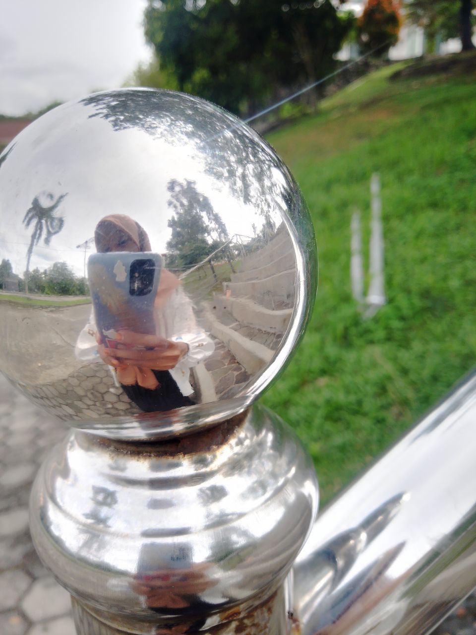 reflection, sphere, nature, day, silver, outdoors, glass, one person, shiny, metal, transparent, adult, plant, men, crystal ball, holding, focus on foreground, close-up, tree