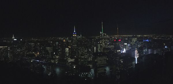 Illuminated cityscape at night