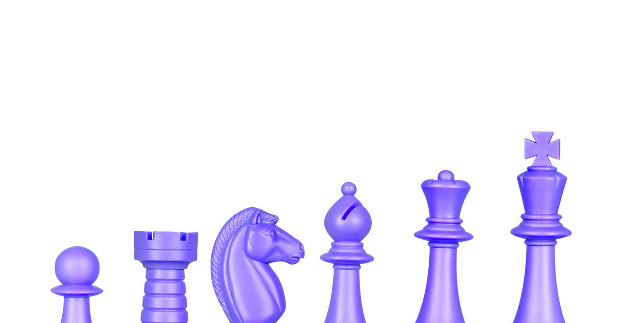 CLOSE-UP OF CHESS PIECES