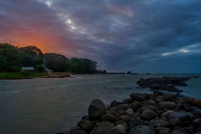 Scenic view of sea against sky at sunset