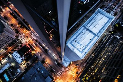 View of buildings in city at night