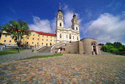 View of cathedral and buildings against sky