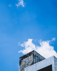 Low angle view of building against blue sky