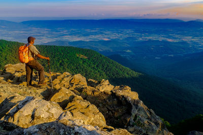 Full length of hiker standing on mountain at shenandoah national park