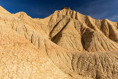 Scenic view of rocky mountains against sky