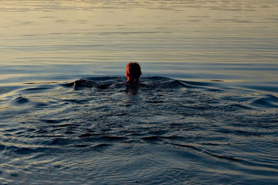 Woman swimming in water