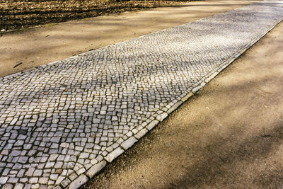 High angle view of footpath by street