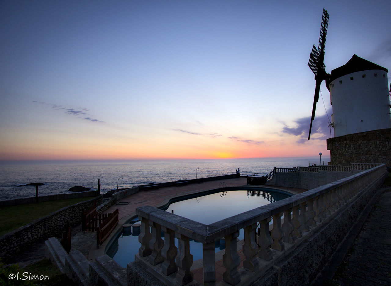 VIEW OF SEA AT SUNSET