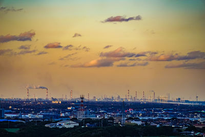 High angle view of cityscape against sky during sunset