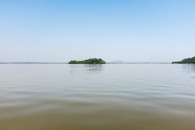 Scenic view of lake against clear sky