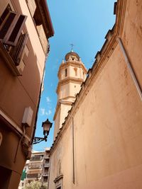 Low angle view of buildings against sky