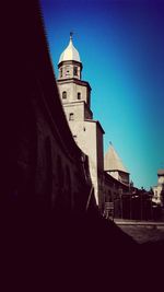 Low angle view of church against blue sky