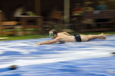 Man with dog in water