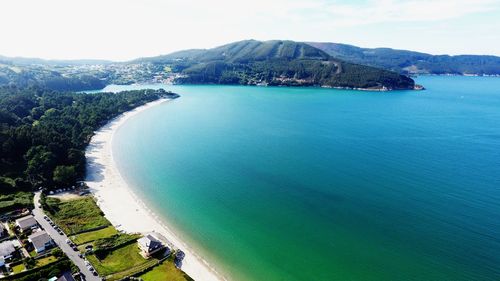 High angle view of bay against sky