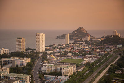 High angle view of cityscape against sky during sunset