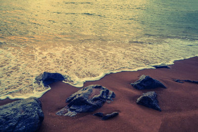 High angle view of rocks on beach