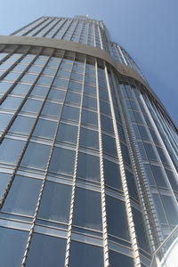 Low angle view of skyscraper against sky