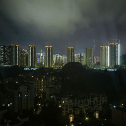 View of city lit up at night