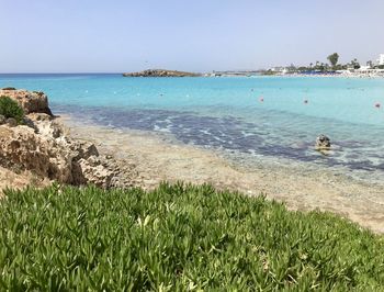 Scenic view of sea against clear sky
