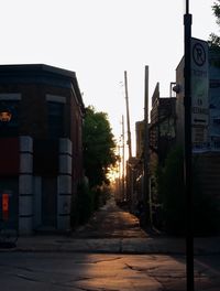 Street amidst buildings against sky
