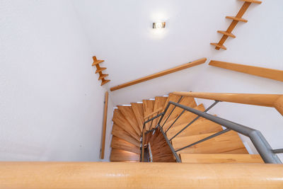 Low angle view of spiral staircase in building