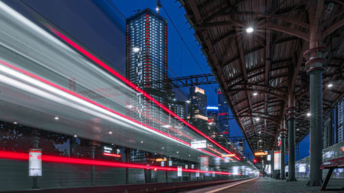 High angle view of light trails on road at night