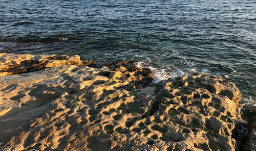 High angle view of rocks on beach