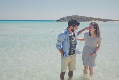 Young friends on the beach
