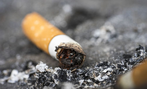 Close-up of cigarette with ash