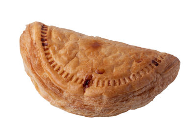 High angle view of a bread on white background