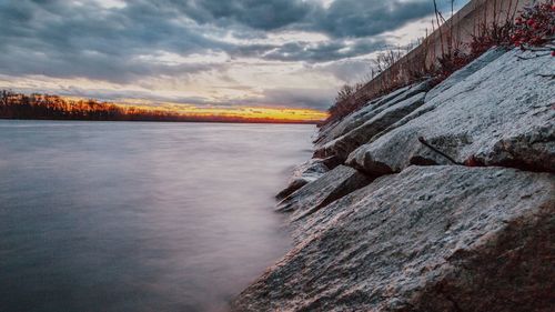 Scenic view of snow covered landscape against sky