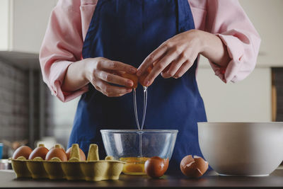 Midsection of woman holding food