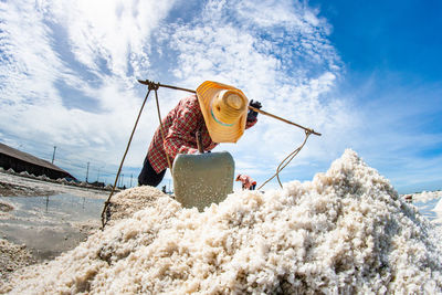 Man working at salt flat