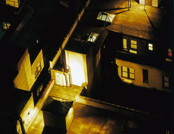 Illuminated building in city at night