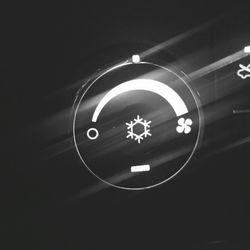 Low angle view of illuminated lights at night