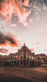 View of old building against cloudy sky