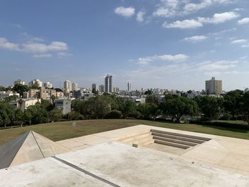 Buildings in city against sky