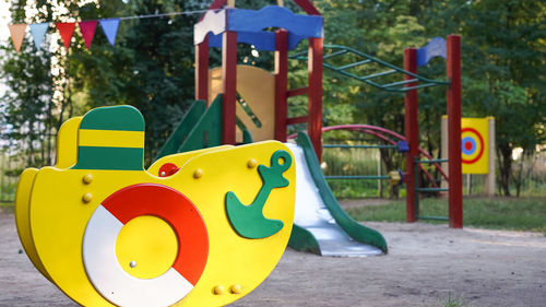 Close-up of yellow toy in park