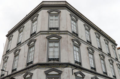 Low angle view of old building against sky