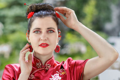 Close-up of young woman with eyes closed