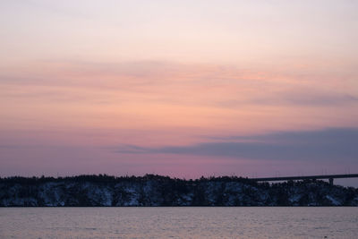 Scenic view of silhouette trees against sky during sunset