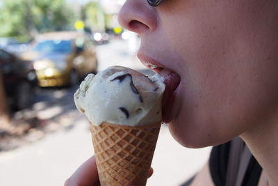 Cropped hand holding ice cream