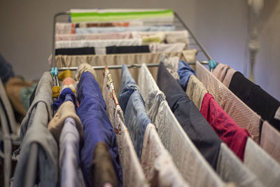 Close-up of clothes on drying rack